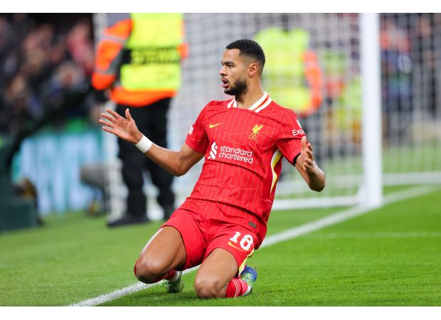 Confirmed starting lineups and predicted team formations for the highly anticipated match between Liverpool and Manchester City, along with any reported injuries.