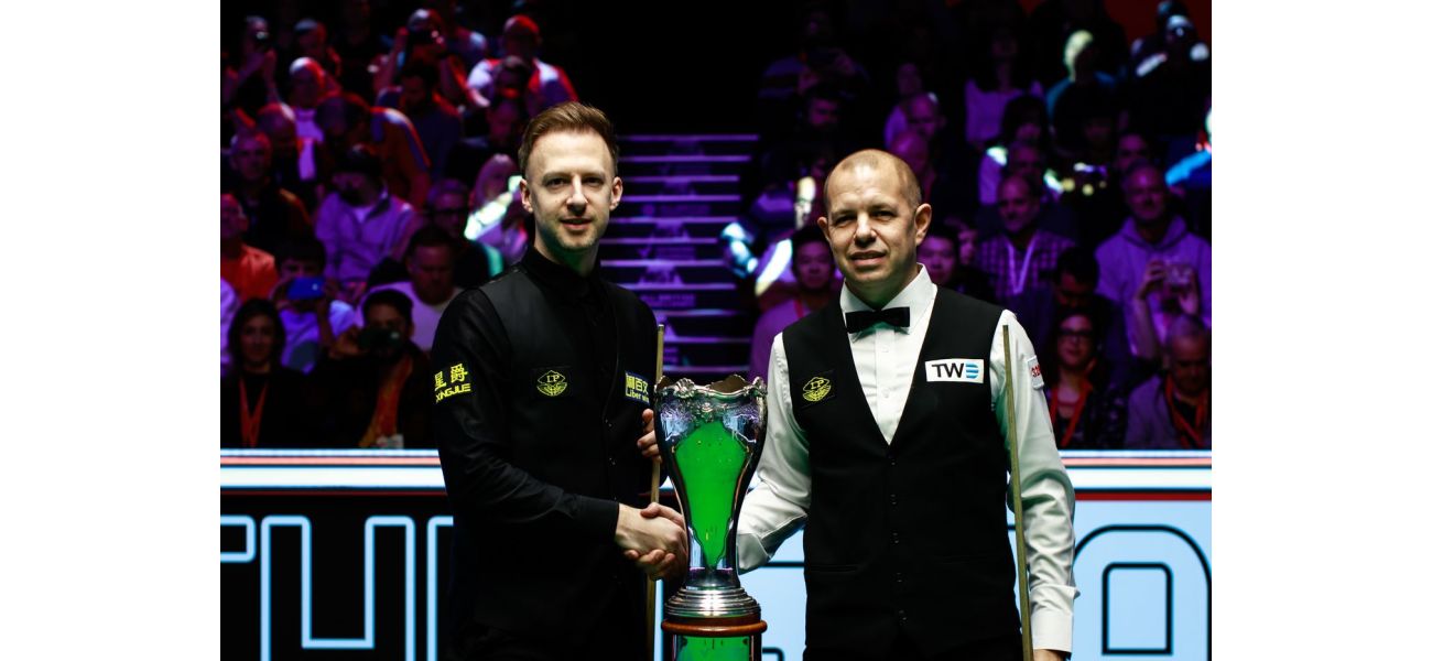 Judd Trump beats Barry Hawkins in thrilling UK Championship final.