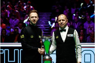 Judd Trump beats Barry Hawkins in thrilling UK Championship final.