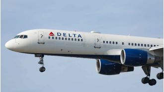 An illegal passenger caused trouble on a flight back to New York after flying from Paris without permission.