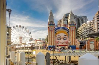 The identity of the new owner of Sydney's famous Luna Park has been revealed, solving the mystery surrounding the ownership change.