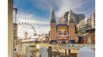 The identity of the new owner of Sydney's famous Luna Park has been revealed, solving the mystery surrounding the ownership change.