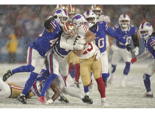 McCaffrey injured knee in 49ers' game against Buffalo.