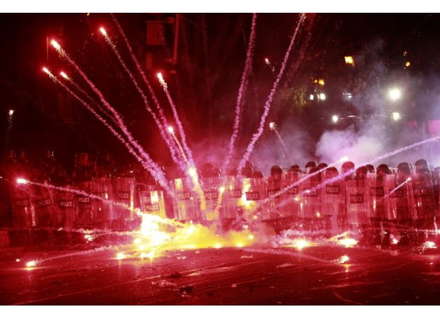 Dozens hospitalized in Georgia during protests over halted EU negotiations.