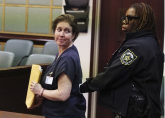 Woman in Florida gets life sentence for putting boyfriend in suitcase.