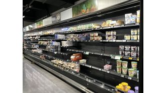 Woolworths plans to take action to prevent striking workers from blocking their warehouses.