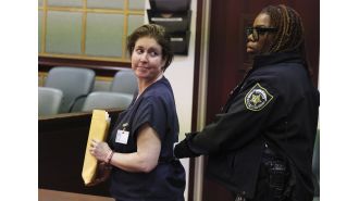 Woman in Florida gets life sentence for putting boyfriend in suitcase.