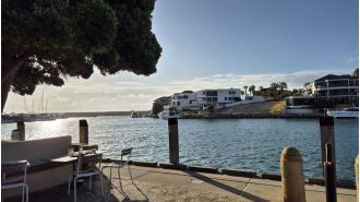 Perth coast capsizing kills one, injures another.