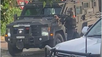 Police were alerted to a teenager posting a photo of a gun, leading to a police operation.