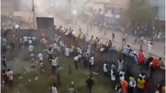 Many people, including children, died in a stampede at a football game.