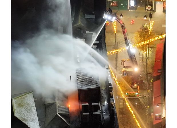 Fire near UK's oldest cathedral, urging residents to close windows.