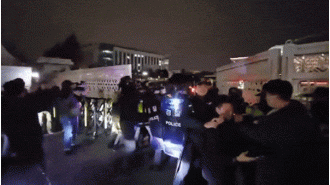 Large demonstrations erupt as South Korean leader imposes martial law