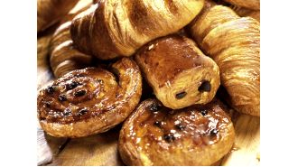 A woman is suspected of intentionally setting fire to her bakery in order to collect $2.7 million in insurance money.