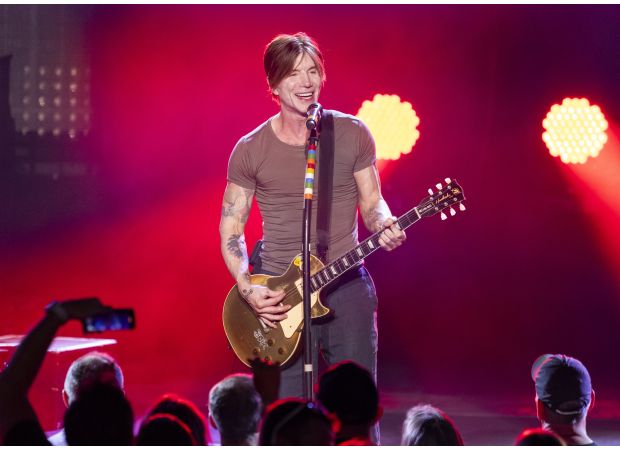 Rock band from 1980s postpones concerts due to lead singer's pneumonia diagnosis.