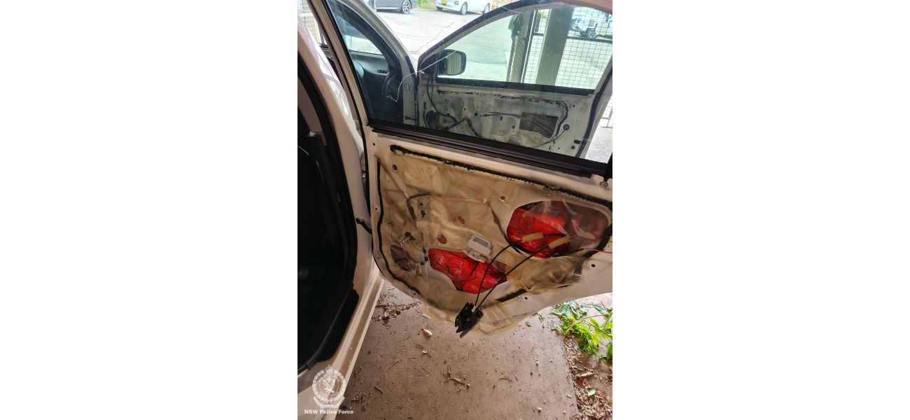 A Putin photo was used as a cover to hide $18 million worth of drugs concealed in car doors.