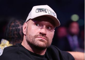 Boxing champ Fury may face 48-year-old legend in highly anticipated title match.