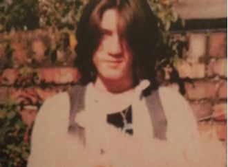 Legendary Bake Off star looks completely different with long, messy hair in retro 80s style.