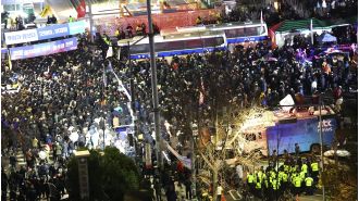 Australia warns against traveling to South Korea after unexpected declaration of martial law.