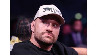 Boxing champ Fury may face 48-year-old legend in highly anticipated title match.