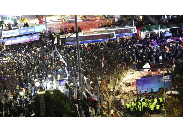 Australia warns against traveling to South Korea after unexpected declaration of martial law.