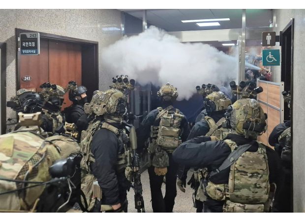 Calls for South Korean leader to step down or face impeachment for implementing abrupt martial law.