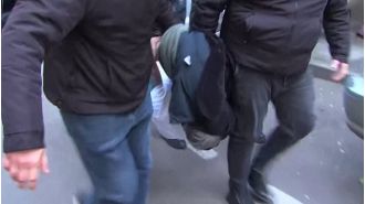 A politician was forcibly removed from his office and attacked by police until he passed out.