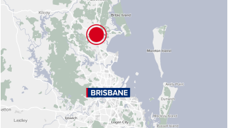 Murder suspect extradited across state lines after victim's body found in trailer.