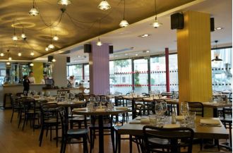 A scathing review of Gregg Wallace's restaurant, calling it a disaster.