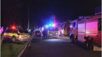 Wheelchair-bound woman saved from fire in her home.