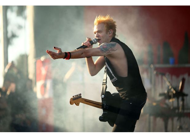 Popular 00s punk band cancels tour last minute due to lead singer's sickness.