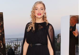 Actress Amber Heard is happily expecting her second child.