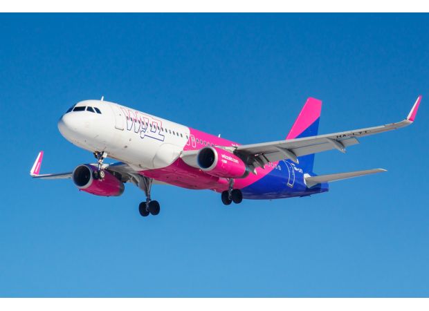 Wizz Air restarts 'unpopular' unlimited flying program, causing dissatisfaction among travelers.