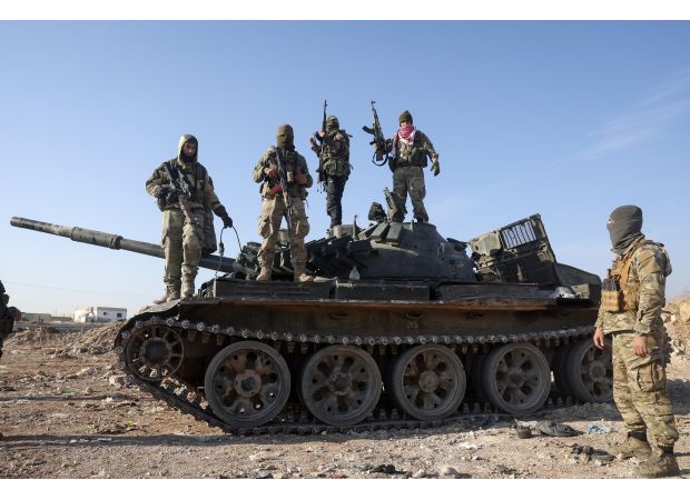 Rebels in Syria seize important city of Hama.