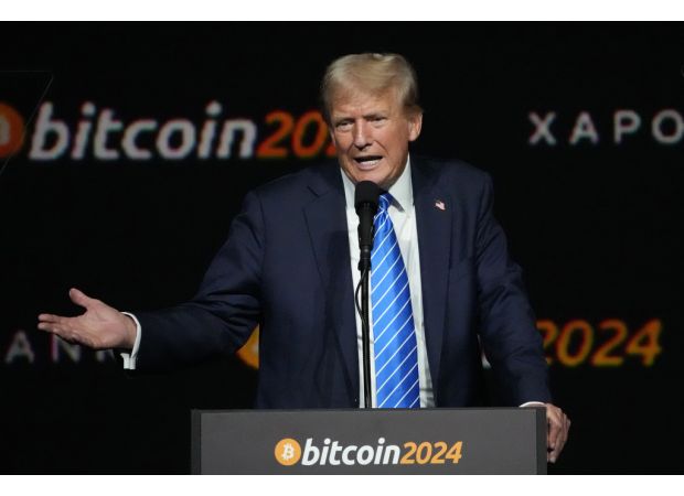 Bitcoin hits record high of $100,000 following continued surge from Trump's election victory.