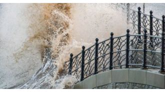 UK prepares for severe weather with strong winds and potential snow and rain, as red alert is issued by Met Office.