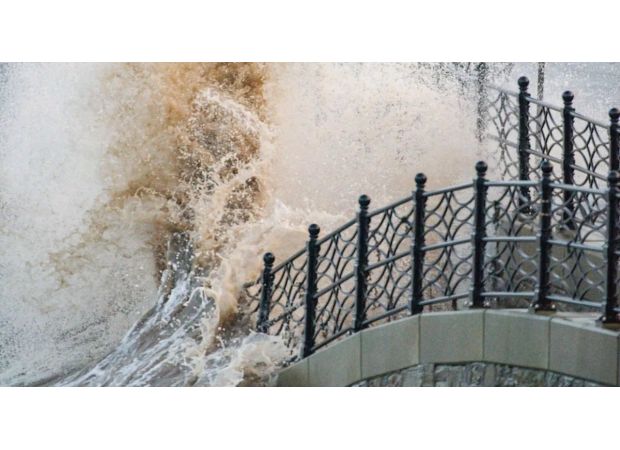 UK prepares for severe weather with strong winds and potential snow and rain, as red alert is issued by Met Office.