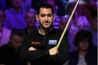 Pool champion ready for victory at Shoot Out event after enjoying unlimited brunch for two hours.