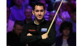 Pool champion ready for victory at Shoot Out event after enjoying unlimited brunch for two hours.