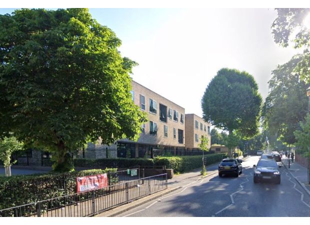 A fire erupted at a school in east London during strong 90mph winds.