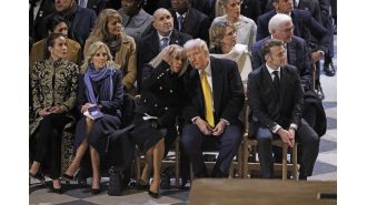 Biden absent as global leaders meet for Notre Dame's reopening.