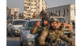 Who are the opposition forces at the gates of Damascus and what will happen next?