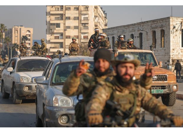 Who are the opposition forces at the gates of Damascus and what will happen next?