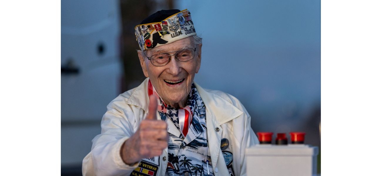 A 100-year-old survivor honors Pearl Harbor Remembrance Day through photos.