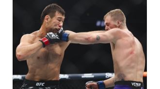 Pantoja retains flyweight title by submitting Asakura with technical move.