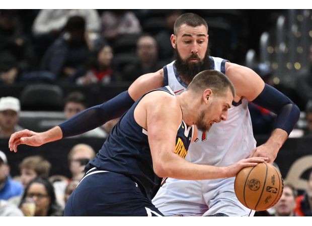 Nikola Jokic scores 56 points but Wizards break 16-game losing streak against Nuggets.