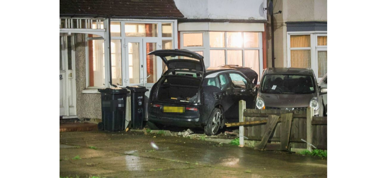 A woman in her 60s died when her car collided with a house.
