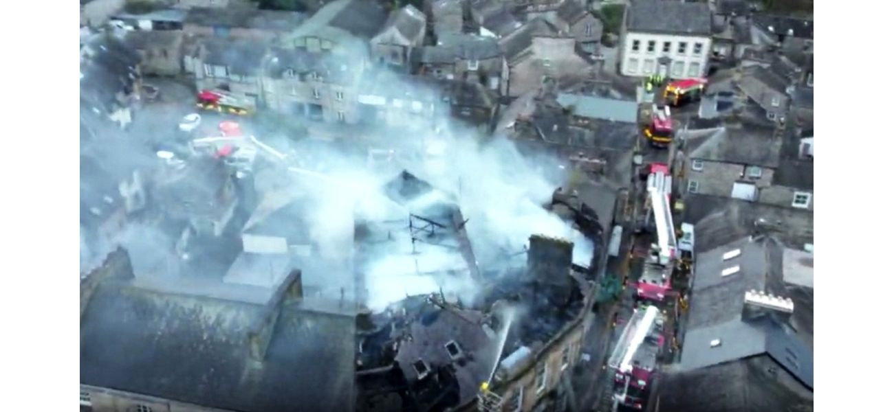A man in his 40s died in a fire that destroyed an apartment building.