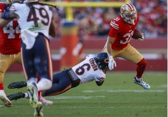 49ers' Guerendo shows off versatility in first start against Bears, shrugs off foot injury.