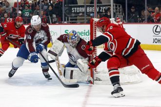 Avalanche dominates Devils after rocky start, secures victory.