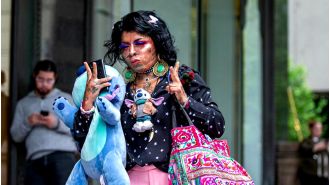 Woman jailed for bringing golden gun into Sydney airport after 'forgetting' it was in her bag.